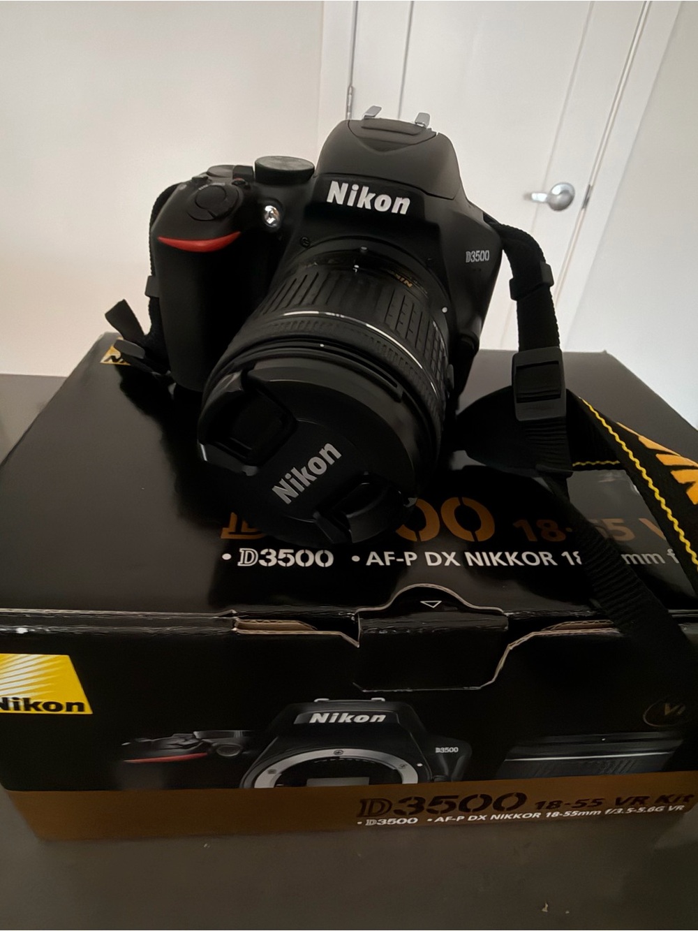 Nikon D3500 Black DSLR with 18-55mm Kit Lens and Black/Yellow Strap